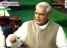Prime Minister A.B. Vajpayee addresses the Lok Sabha members after the Opposition attacked him on the Ayodhya issue on Monday.