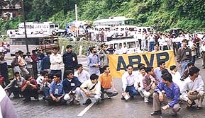 ABVP activists block the national highway in Shimla on Monday.