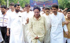 Lok Jan Shakti Party president Ram Vilas Paswan, his brother Ramchander Paswan and other party leaders during a protest march against the demolition