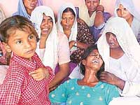 An inconsolable Narinder Kaur, whose son was among six residents of Hamiri Khera village in Jalandhar district who were killed