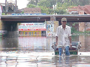 The old Domoria bridge is still a source of inconvenience to residents of Jalandhar and this is visible from the plight of this rickshawpuller.