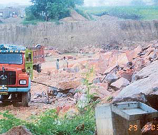 Illegal mining of stones and sand continues in this quarry in Ferozepur Rajput village, where contract in auction has been allotted only for mining of stones. 
