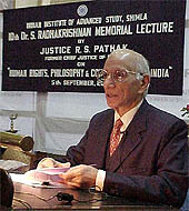 Justice R.S. Pathak addresses a gathering 