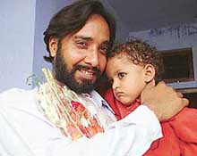 Inderjeet Singh of Barara (Ambala) with a child after his release from a jail in Pakistan.
