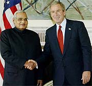 US President George W. Bush shakes hands with Indian Prime Minister Atal Bihari Vajpayee