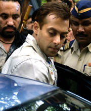 Bollywood star Salman Khan gets into his car as he leaves a Bombay court on Monday.