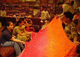 Shopping spree: Ludhiana women busy buying clothes on Thursday. Photo Pradeep Tewari