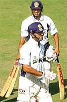 Happiess is writ large on Yuvraj Singh's face as he walks ahead of Sachin Tendulkar