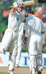 New Zealand's Lou Vincent is ecstatic after hammering a century on the first day of the second Test against India at the PCA Stadium, Mohali, on Thursday. 