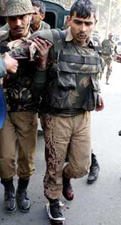 A BSF jawan, injured during an encounter with militants being removed to hospital in Srinagar on Saturday.