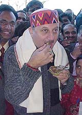Film actor Anupam Kher eats tikki at the famous Sita Ram shop in Lakkar Bazar, Shimla, on Monday.