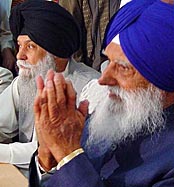 SGPC President Gurcharan Singh Tohra greets PAC members at a meeting in Chandigarh on Tuesday as Capt Kanwaljit Singh looks on