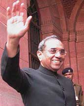 New Foreign Secretary Shashank waves as he arrives to take charge at South Block in New Delhi on Tuesday