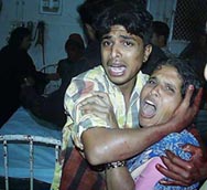 Grief-stricken mother and brother of Mohd Azam at the Osmania Hospital in Hyderabad on Sunday. Critically injured Azam was admitted to the hospital after a bullet hit him on his head