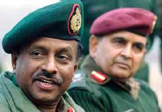 Lieut-Gen L.P. Balagalle, chief of the Sri Lankan Army, speaks as Indian Armys Lieut-Gen Nirbhay Sharma looks on at a news conference in Srinagar on Monday.