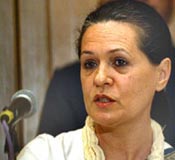 Congress President Sonia Gandhi speaks during a news conference in Mumbai