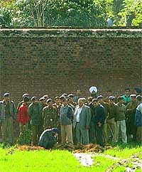 Chandigarh Home Secretary R.S. Gujral inspects the exit of the tunnel dug by the alleged assassins of Beant Singh