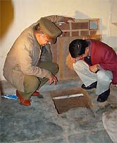 Officials on Friday inspect the entry point of the tunnel dug in Chandigarh's Burail Jail