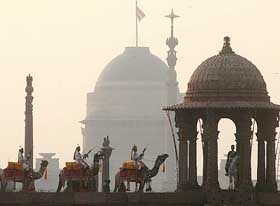 BSF personnel astride camels in front of Rashtrapati Bhavan as they take part in a Beating the Retreat Parade in Delhi