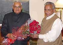 Former UP Chief Minister Kalyan Singh with Atal Bihari Vajpayee at his residence in the Capital