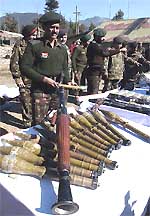 The Army displays arms and ammunition seized from militants