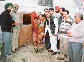 Ms Kashmir Kaur, councillor of Ward No. 5, lays the foundation stone of a road in the area