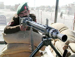 A Pakistani soldier mans a machine-gun on the Pakistan-Afghan border at Chaman, 125 km from Quetta, on Saturday. 