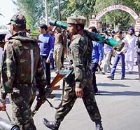 Army personnel carry out search operations after militants attacked a jail in Jammu on Wednesday. 