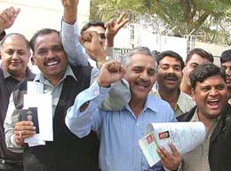 A group of visa-seekers from Ludhiana in a happy mood after getting the visa for the Indo-Pak cricket series outside the Pakistan High Commission in New Delhi on Thursday.