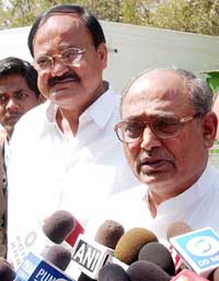 BJP President M. Venkaiah Naidu with RSS leader Madan Dass Dev at a Press conference outside the Prime Ministers residence in New Delhi on Friday.