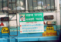 A board listing achievements of the INLD government fixed on a Haryana Roadways bus.
