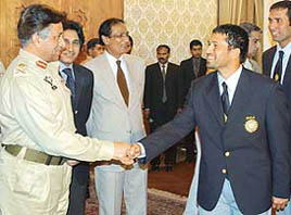 Pakistan President General Pervez Musharraf greets Sachin Tendulkar during a meeting in Islamabad on Wednesday. 