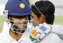 Captain Sourav Ganguly chats with Mohammad Kaif during a practice session at the Gaddafi Stadium in Lahore on Tuesday.