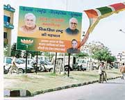 A banner put up by the BJP with photographs of Prime Minister Atal Bihari Vajpayee, Deputy Prime Minister L.K. Advani and Union Minister of State for Home Affairs I.D. Swamy violates the Model Code of Conduct in Karnal 
