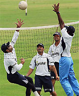 A different ball game: Indian players Yuvraj Singh, Sachin Tendulkar, skipper Rahul Dravid and Laxmipathi Balaji play volleyball during the training session on the eve of their second Test match against Pakistan at Gaddafi stadium in Lahore on Sunday .
