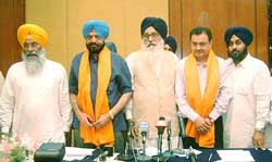 Mr Balbir Singh, senior Congress leader and MP of the dissolved Lok Sabha, announces his joining the Shiromani Akali Dal (SAD), in the presence of SAD supremo Parkash Singh Badal and other leaders in Jalandhar on Monday.