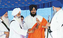 Giani Rattan Singh Jathedar of Takht Sri Hazoor Sahib and Giani Iqbal Singh, Jathedar Takht Sri Patna Sahib, present siropas to Ms Joginder Kaur Tohra