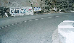 A rock in the Sundernagar forest area along National Highway 21, has been defaced by a political party in violation of the Forest Conservation Act.