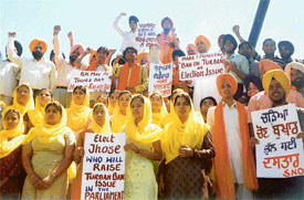 Members of the Sikh Nation Organisation protest against the ban on turban by France and the indifference of various political parties towards the issue