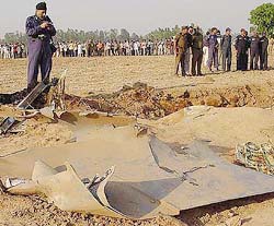 Air Force officers inspect the wreckage of the Jaguar which crashed in Ambala on Thursday.