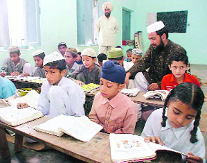 Secular show: Hindus, Sikhs and Muslims study together at the Jamia Shaw Walli Ullah madrasa, near Malerkotla.