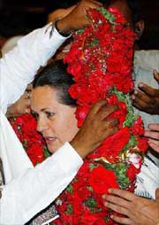 Sonia Gandhi is garlanded by partymen soon after being elected Leader of the Congress Parliamentary Party at the Parliament House in New  Delhi on Saturday. 