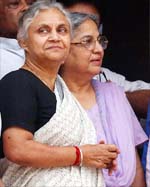 Delhi Chief Minister Sheila Dikshit with Ms Gursharan Kaur, wife of Prime Minister-designate Manmohan Singh, in New Delhi on Thursday. 