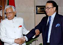 Union External Affairs Minister Natwar Singh (left) with his Bangladeshi counterpart M Morshed Khan during a meeting in New Delhi on Tuesday