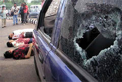 Bodies of four Lashkar-e-Toiba militants lie on the ground after an encounter with the police in Ahmedabad 