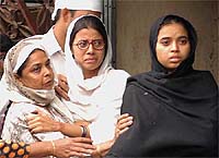 Ishrats family members mourn as her body is brought to her Mumbra residence 