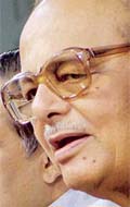HRD Minister Arjun Singh addresses a press conference