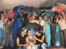 Members of the Astha Club celebrate sawan at a function organised