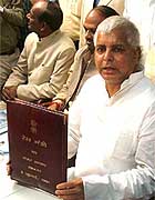 Railway Minister Laloo Prasad Yadav after giving final touches to the Rail Budget in New Delhi