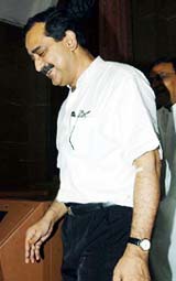 Mr Ashok Lahiri, Economic Adviser to the Finance Minister leaves Parliament House after submitting the Economic Survey report 2003-2004 in New Delhi